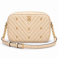 Crossbody Victoria’s Secret Beige con logos dorados