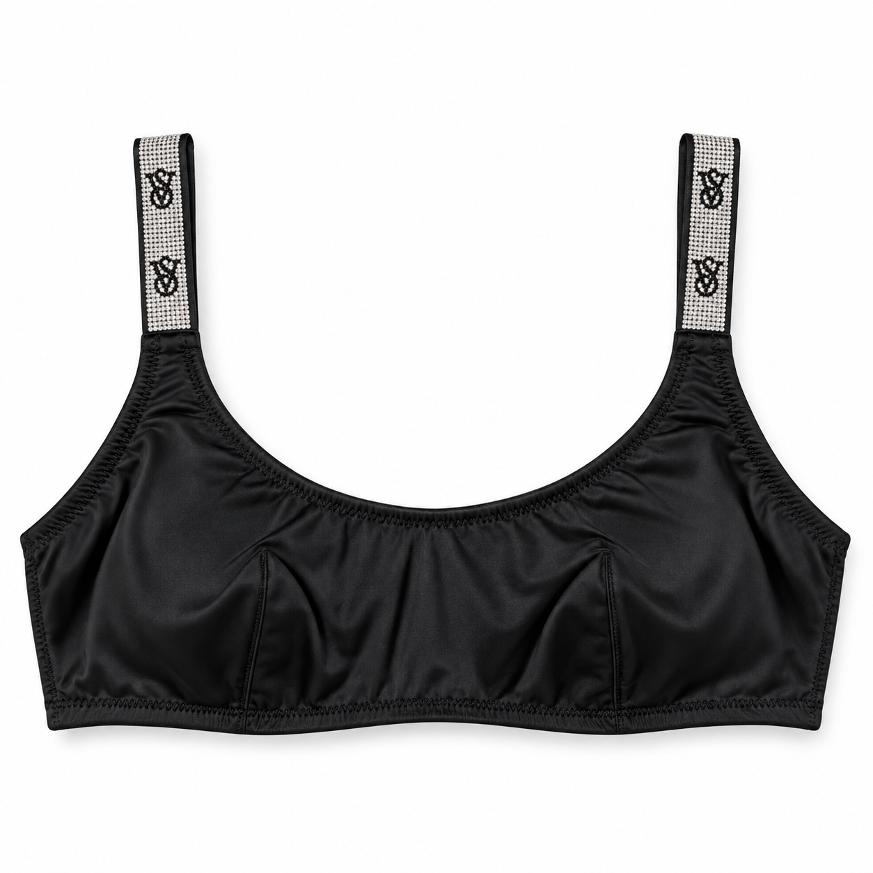 Peto Victoria’s Secret negro con tirantes de brillos sobre fondo blanco
