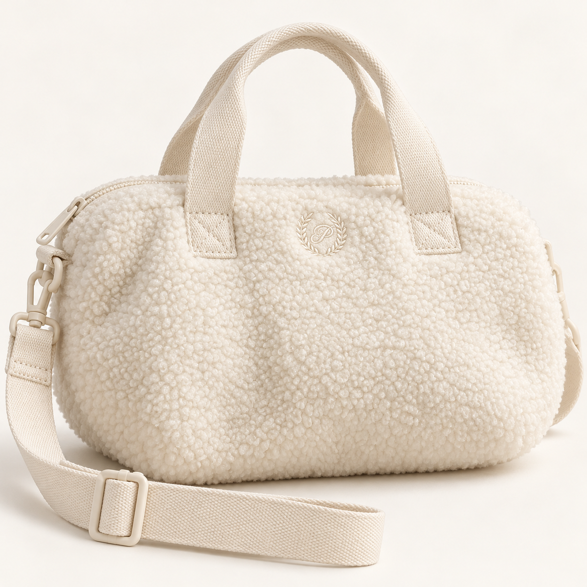 Mini bolso PINK de borreguito color crema con correa ajustable
